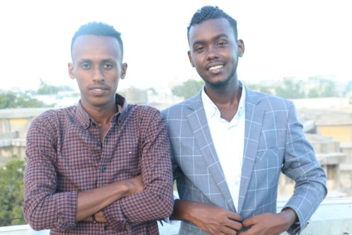 Journalist Abdullahi Hussein Anshur (right) and cameraman Mohamed Abdulkadir Jirow. PHOTO_COURTESY_SJS