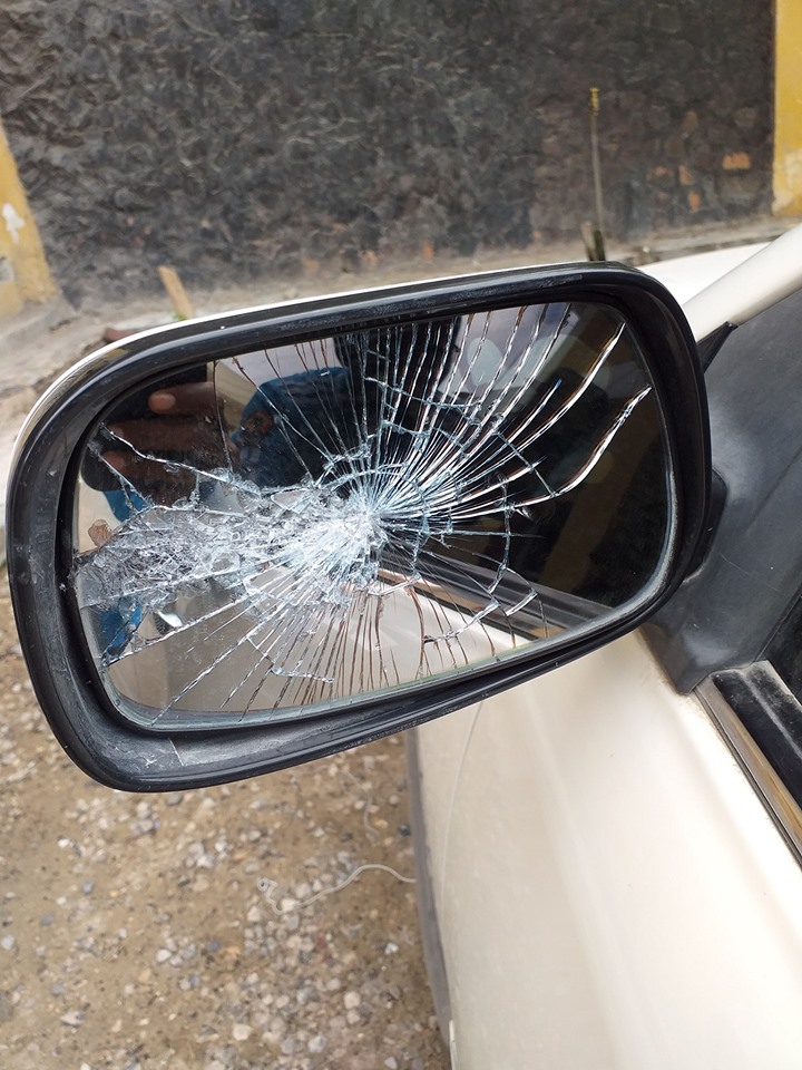 Photo shows the smashed sidebar mirror of the journalist's car. | Photo courtesy/Facebook Hussein Abdulle Mohamed.