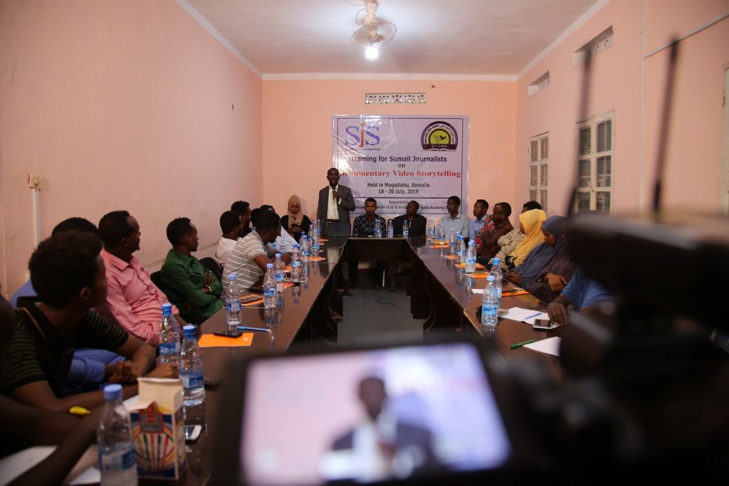 Abdalle Ahmed Mumin, the Secretary General of Somali Journalists Syndicate (SJS) gives opening remarks during the kick-off of a two-week training course on Documentary Video Storytelling in Mogadishu, Somalia, Thursday 18 July, 2019.