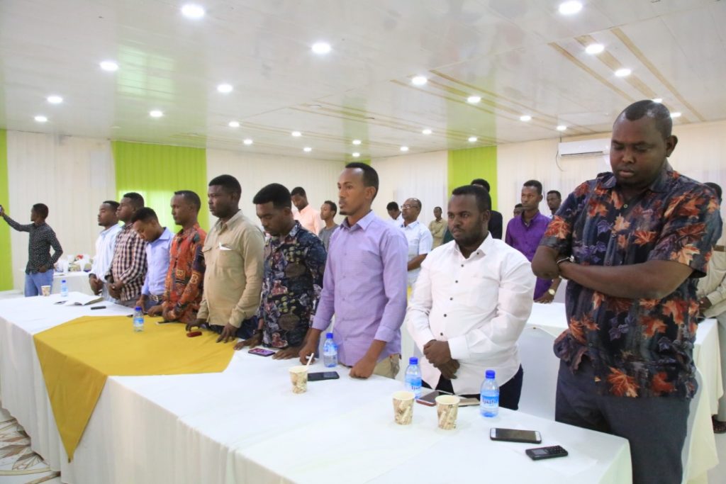 Journalists observe a minute of silence and prayer for the slain colleagues in Somalia during the commemoration of International  Day to End Impunity for Crimes  Against Journalists held in Mogadishu, 2 November 2020. |  PHOTO/SJS.