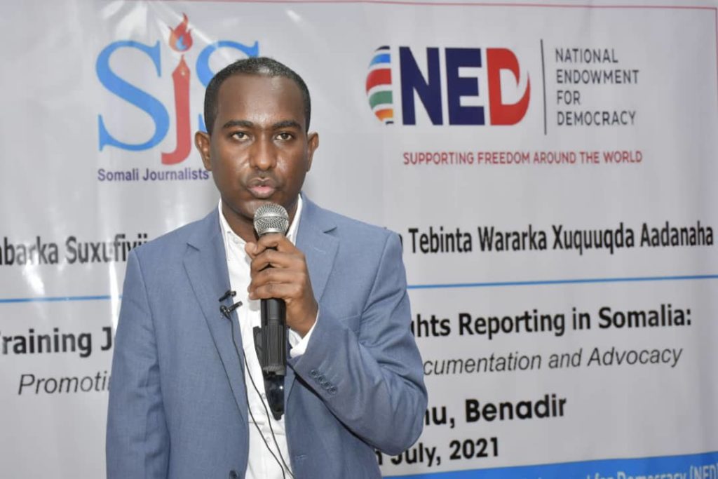 SJS Secretary General,  Abdalle Ahmed Mumin speaks during the launch of journalists human rights training in Mogadishu on Wednesday 28 July, 2021. | Photo Credit/SJS.