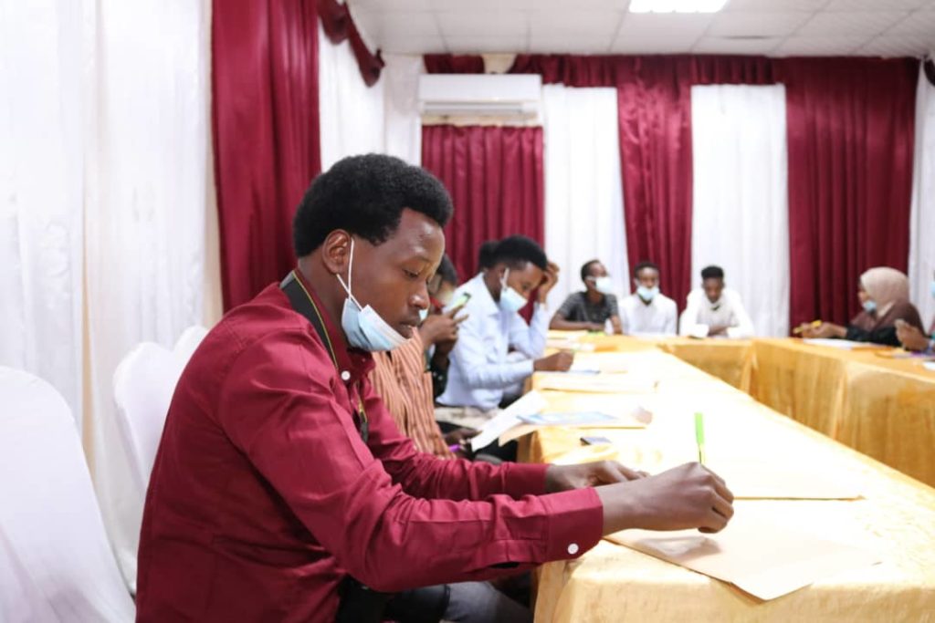 A group of participants listen during the launch of journalists human rights training in Mogadishu on Wednesday 28 July, 2021. | Photo Credit/SJS.