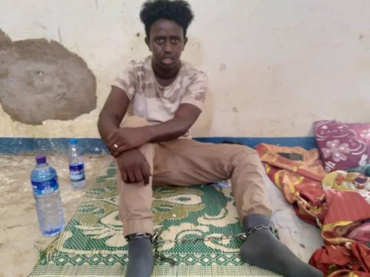 Chained journalist Mohamed Abdiweli Tohow is held at Dhusamareb police station. | PHOTO CREDIT/Private.