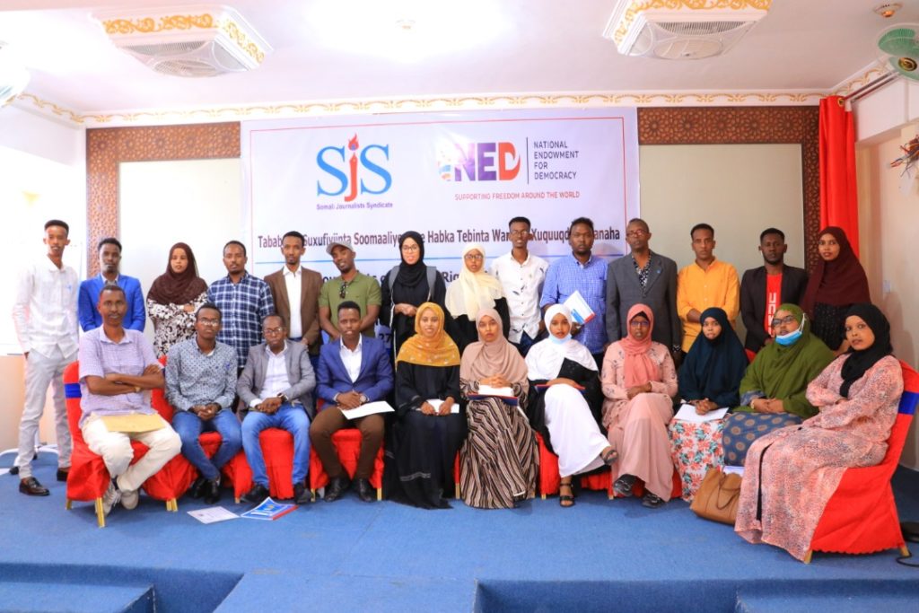 Trainees pose for a group photo during the conclusion of a three-day human rights training in Garowe, Puntland, on Wednesday, 29 December, 2021. | PHOTO/SJS.