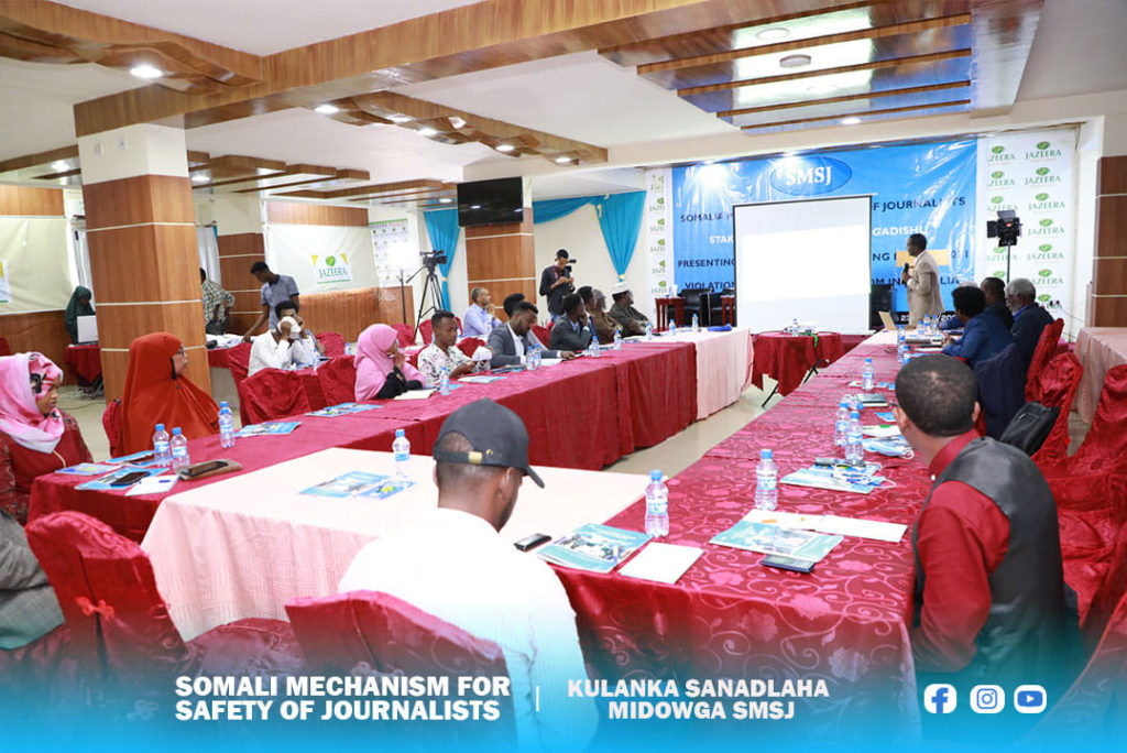 SJS Secretary-General, Abdalle Ahmed Mumin, who is also Secretary-General of SMSJ presented the annual report to CSOs, media and government officials at Jazeera Hotel, Mogadishu, Thursday 23 June, 2022. | PHOTO/Dalsan TV.