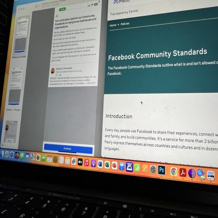 A photo shows Facebook's Community Standards page alongside a screenshot of journalist Zakariye Timacadde whose Facebook page was restricted after posting interview critical to Somali authorities. | PHOTO Credit/SJS.